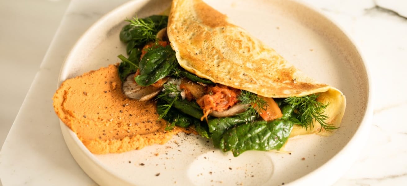 A dish with a spinach omelette